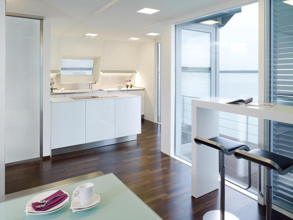 A striking contemporary float home with 2 bedrooms in 1,044 sq ft. | www.facebook.com/SmallHouseBliss