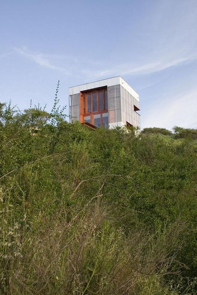 A small modern cabin built with straw bales. | www.facebook.com/SmallHouseBliss