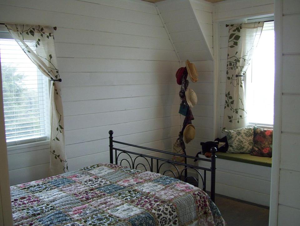 AnnaMarie's Cottage, a small owner-built home with custom hand-crafted features. It has one bedroom in 716 sq ft. | www.facebook.com/SmallHouseBliss