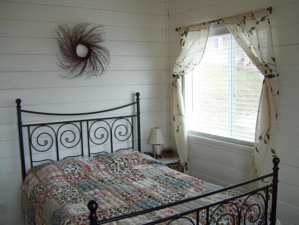 AnnaMarie's Cottage, a small owner-built home with custom hand-crafted features. It has one bedroom in 716 sq ft. | www.facebook.com/SmallHouseBliss