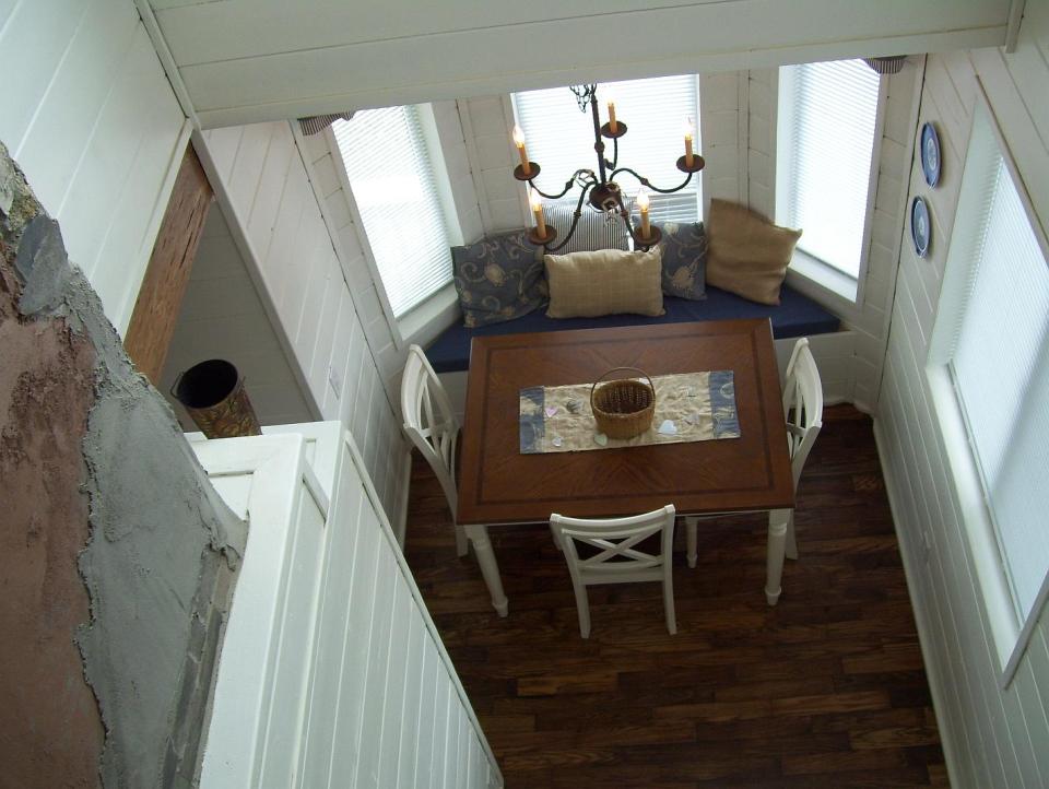 AnnaMarie's Cottage, a small owner-built home with custom hand-crafted features. It has one bedroom in 716 sq ft. | www.facebook.com/SmallHouseBliss