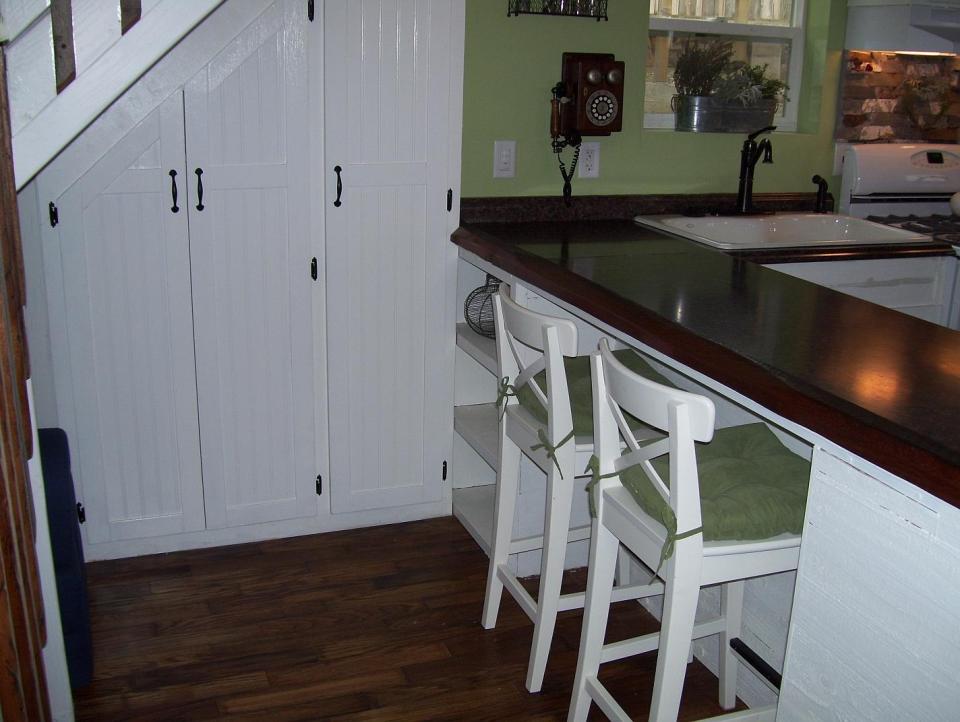 AnnaMarie's Cottage, a small owner-built home with custom hand-crafted features. It has one bedroom in 716 sq ft. | www.facebook.com/SmallHouseBliss