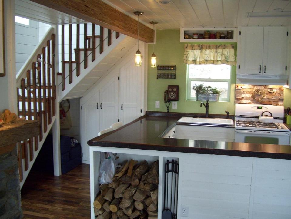 AnnaMarie's Cottage, a small owner-built home with custom hand-crafted features. It has one bedroom in 716 sq ft. | www.facebook.com/SmallHouseBliss