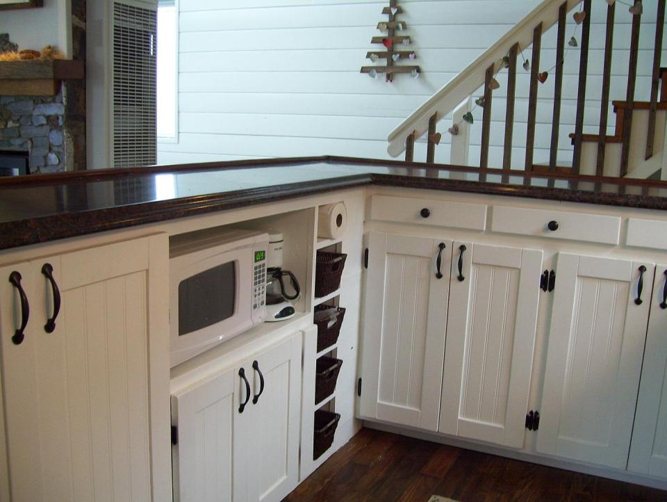 AnnaMarie's Cottage, a small owner-built home with custom hand-crafted features. It has one bedroom in 716 sq ft. | www.facebook.com/SmallHouseBliss