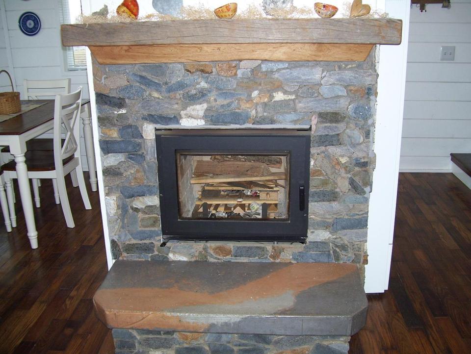 AnnaMarie's Cottage, a small owner-built home with custom handcrafted features. It has one bedroom in 716 sq ft. | www.facebook.com/SmallHouseBliss