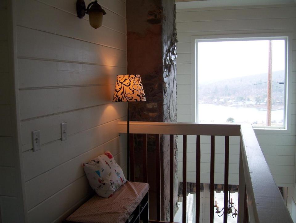 AnnaMarie's Cottage, a small owner-built home with custom hand-crafted features. It has one bedroom in 716 sq ft. | www.facebook.com/SmallHouseBliss