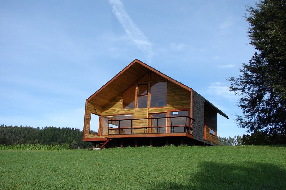 Cabaña Bascuñan, a family vacation house with a surprising and playful design. It has two bedrooms and a very large loft in 1,184 sq ft. | www.facebook.com/SmallHouseBliss