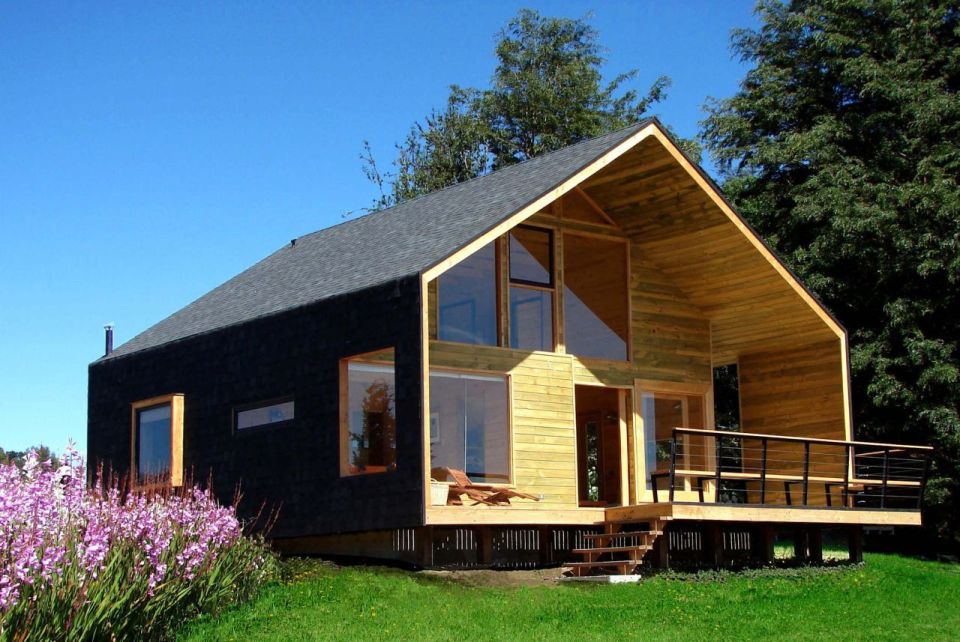 Cabaña Bascuñan, a family vacation house with a surprising and playful design. It has two bedrooms and a very large loft in 1,184 sq ft. | www.facebook.com/SmallHouseBliss