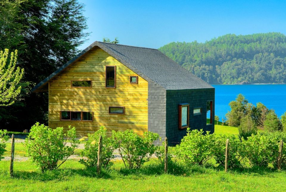 Cabaña Bascuñan, a family vacation house with a surprising and playful design. It has two bedrooms and a very large loft in 1,184 sq ft. | www.facebook.com/SmallHouseBliss