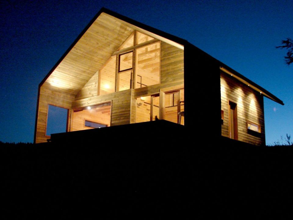 Cabaña Bascuñan, a family vacation house with a surprising and playful design. It has two bedrooms and a very large loft in 1,184 sq ft. | www.facebook.com/SmallHouseBliss