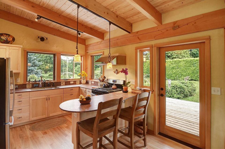 River Road House, a beautiful and sustainable timber frame home with two bedrooms in 800 sq ft. | www.facebook.com/SmallHouseBliss