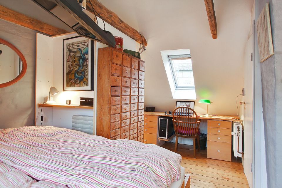 Space-saving tricks make the most of this tiny heritage townhouse in Denmark. It has 1 bedroom in 527 sq ft. | www.facebook.com/SmallHouseBliss