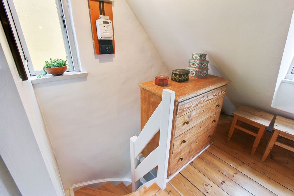 Space-saving tricks make the most of this tiny heritage townhouse in Denmark. It has 1 bedroom in 527 sq ft. | www.facebook.com/SmallHouseBliss