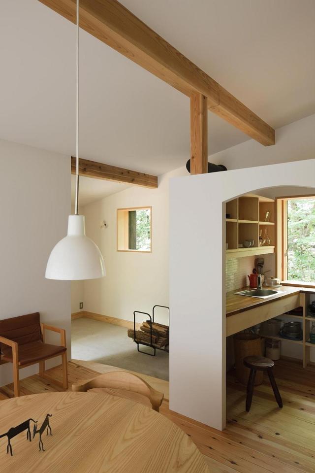 Habuka mountain retreat, a small timber-framed ski cabin in the Japanese Alps. It has 1 bedroom and a loft in 590 sq ft. | www.facebook.com/SmallHouseBliss