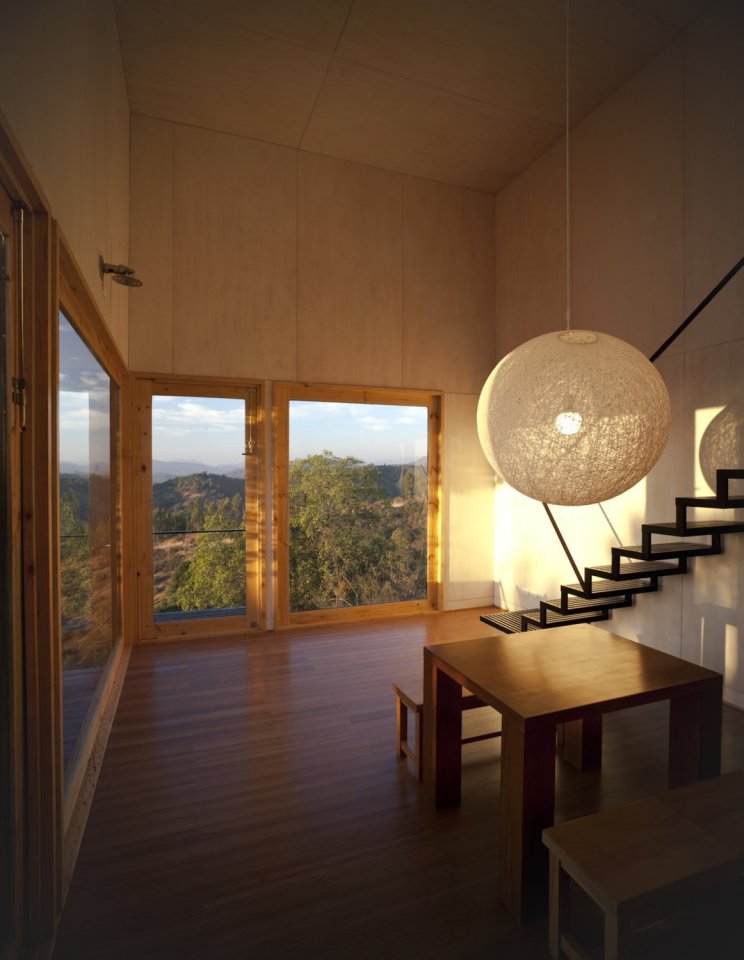 Refugio Pangal, a simple modern cabin in Chile with one bedroom and a loft in 646 sq ft. | www.facebook.com/SmallHouseBliss