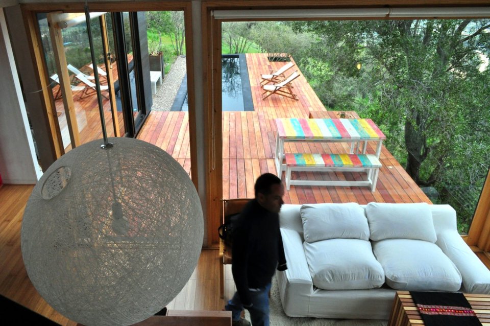Refugio Pangal, a simple modern cabin in Chile with one bedroom and a loft in 646 sq ft. | www.facebook.com/SmallHouseBliss