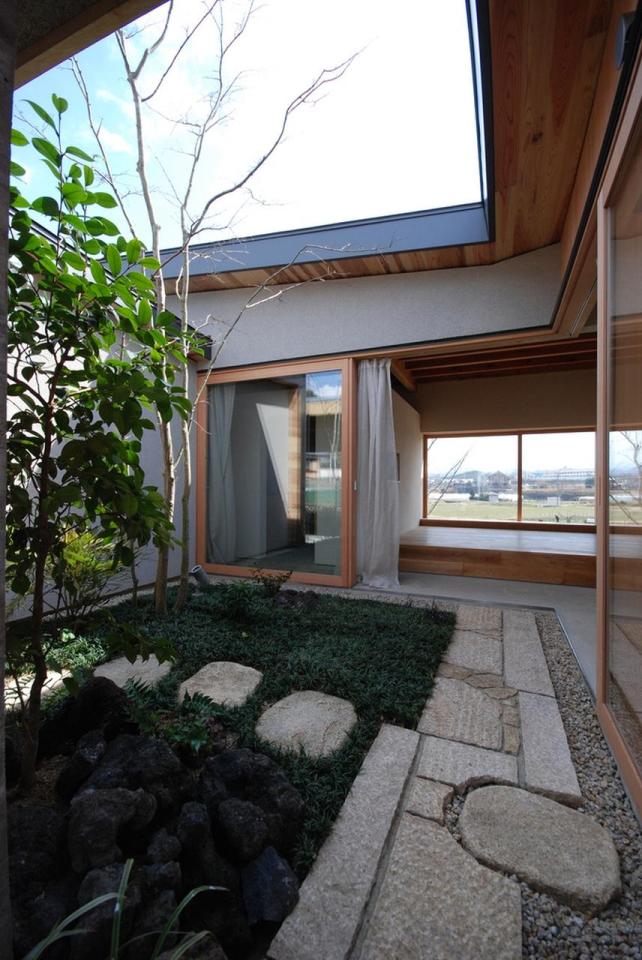 This modern version of the traditional Japanese courtyard house has two bedrooms in 534 sq ft. | www.facebook.com/SmallHouseBliss