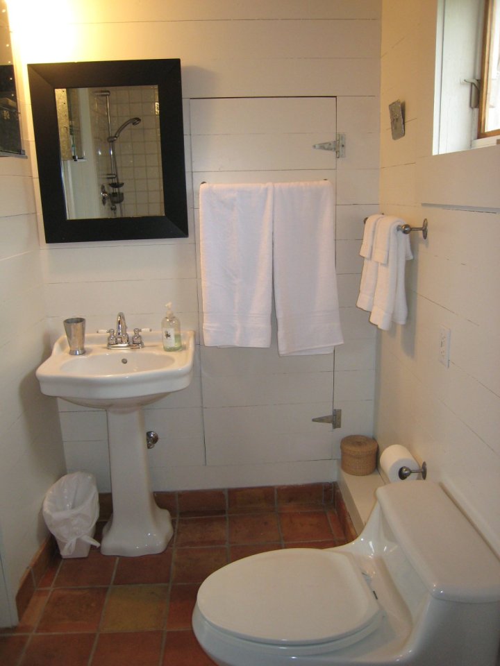 Sea and Sky Cottage on Cape Breton updates the traditional Maritime gable-roofed, shingled house with an open interior. It is 860 sq ft with a lofted bedroom. | www.facebook.com/SmallHouseBliss