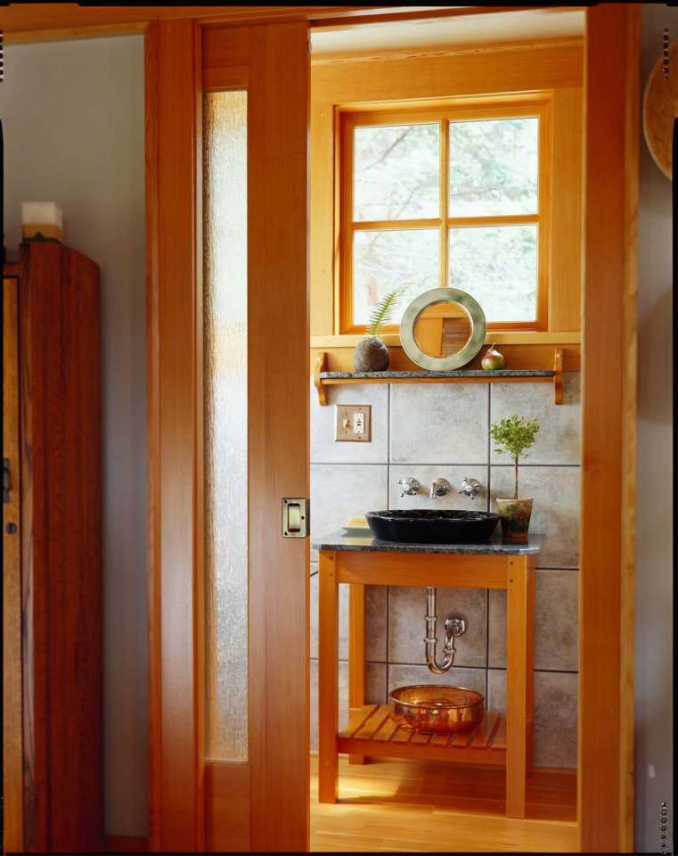 This small cabin in the woods on Orcas Island has a 350 sq ft ground floor plus a sleeping loft. | www.facebook.com/SmallHouseBliss