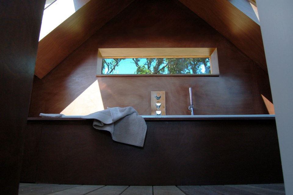 The remnants of a tiny stone cottage were restored and expanded with a small addition. It now has 334 sq ft downstairs and one bedroom up. | www.facebook.com/SmallHouseBliss