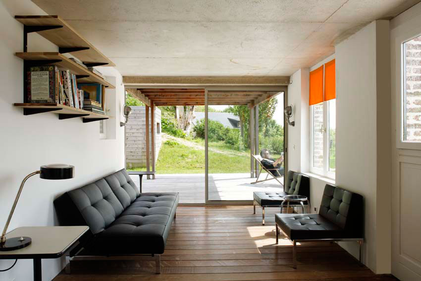 The remnants of a tiny stone cottage were restored and expanded with a small addition. It now has 334 sq ft downstairs and one bedroom up. | www.facebook.com/SmallHouseBliss