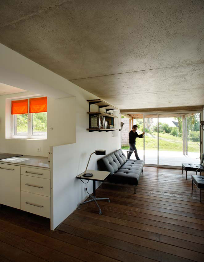 The remnants of a tiny stone cottage were restored and expanded with a small addition. It now has 334 sq ft downstairs and one bedroom up. | www.facebook.com/SmallHouseBliss