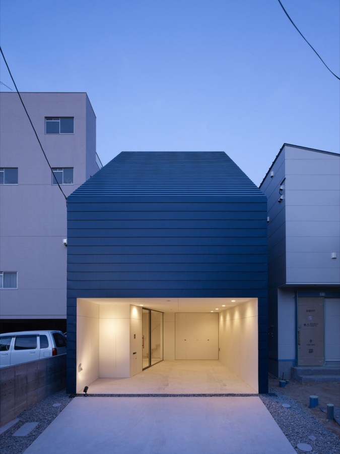 With neighbors close by and no good views, this small house has few windows. Instead, a huge skylight floods the living space with daylight. The house has two bedrooms and a loft in 807 sq ft. | www.facebook.com/SmallHouseBliss