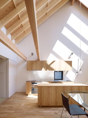 With neighbors close by and no good views, this small house has few windows. Instead, a huge skylight floods the living space with daylight. The house has two bedrooms and a loft in 807 sq ft. | www.facebook.com/SmallHouseBliss