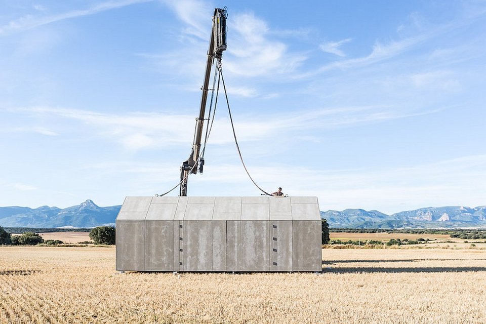 The ÁPH80 Transportable House, a tiny prefab with a minimalist design aesthetic, has one bedroom in 291 sq ft. | www.facebook.com/SmallHouseBliss