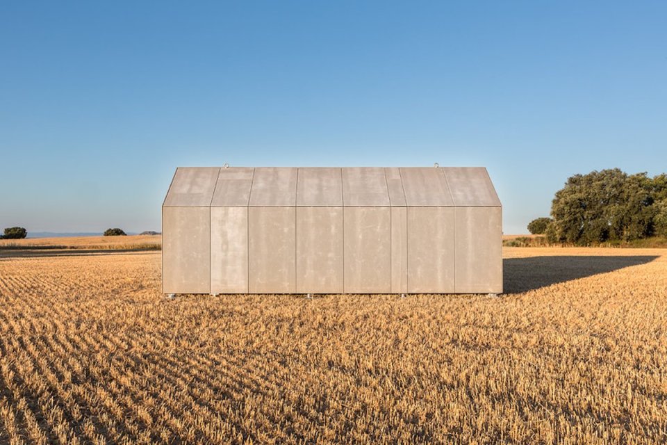 The ÁPH80 Transportable House, a tiny prefab with a minimalist design aesthetic, has one bedroom in 291 sq ft. | www.facebook.com/SmallHouseBliss