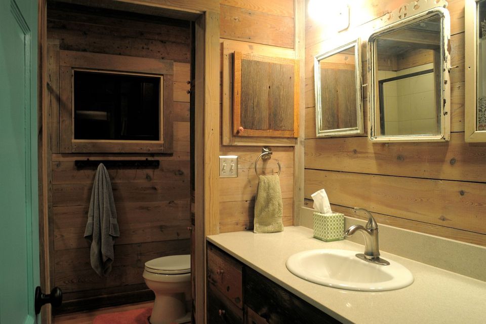 Reclaimed materials give this cabin the rich patina of age. The cabin has one bedroom in 640 sq ft. | www.facebook.com/SmallHouseBliss