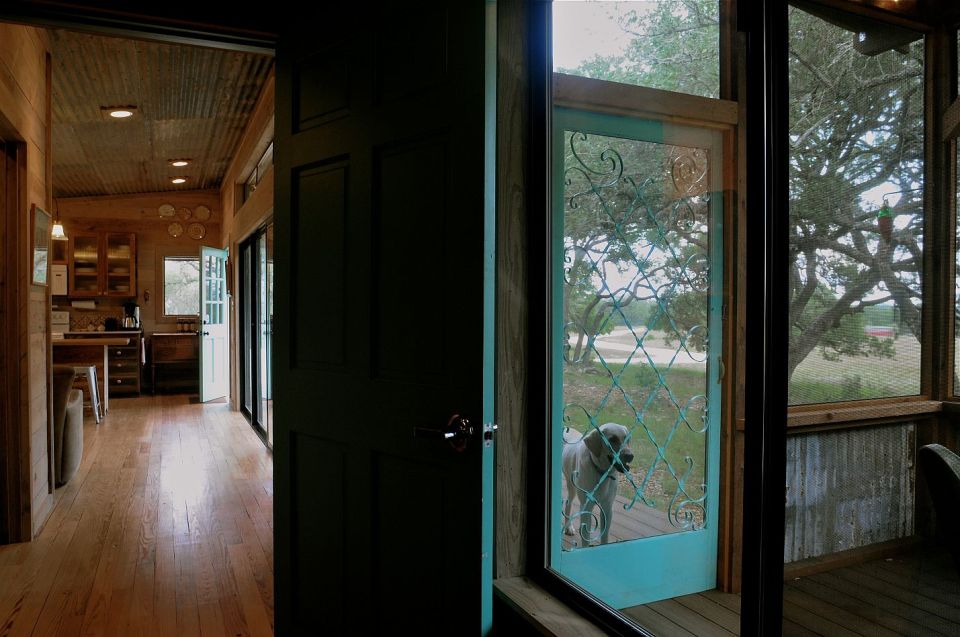 Reclaimed materials give this cabin the rich patina of age. The cabin has one bedroom in 640 sq ft. | www.facebook.com/SmallHouseBliss