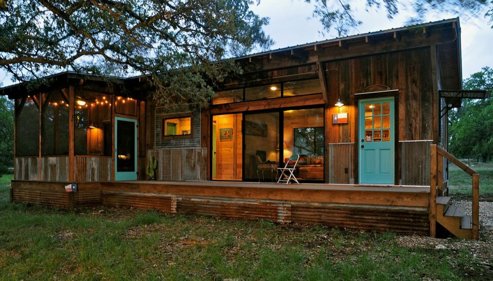 Reclaimed materials give this cabin the rich patina of age. The cabin has one bedroom in 640 sq ft. | www.facebook.com/SmallHouseBliss
