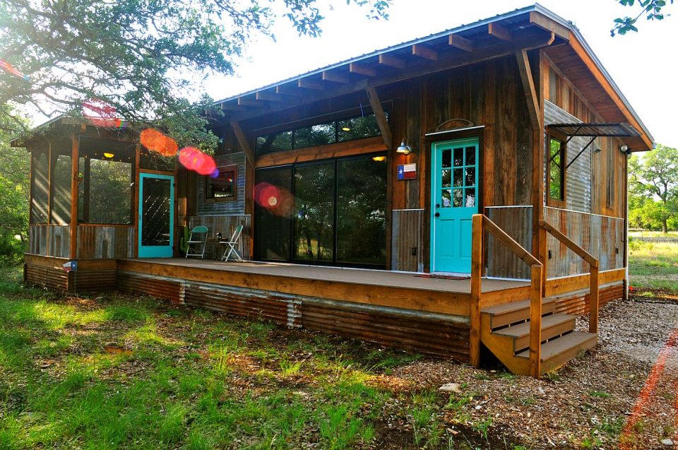 Reclaimed materials give this cabin the rich patina of age. The cabin has one bedroom in 640 sq ft. | www.facebook.com/SmallHouseBliss