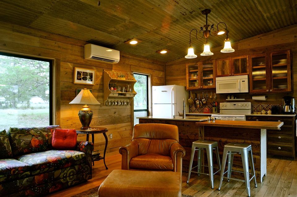 Reclaimed materials give this cabin the rich patina of age. The cabin has one bedroom in 640 sq ft. | www.facebook.com/SmallHouseBliss