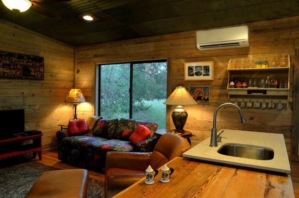 Reclaimed materials give this cabin the rich patina of age. The cabin has one bedroom in 640 sq ft. | www.facebook.com/SmallHouseBliss