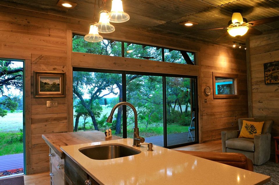 Reclaimed materials give this cabin the rich patina of age. The cabin has one bedroom in 640 sq ft. | www.facebook.com/SmallHouseBliss