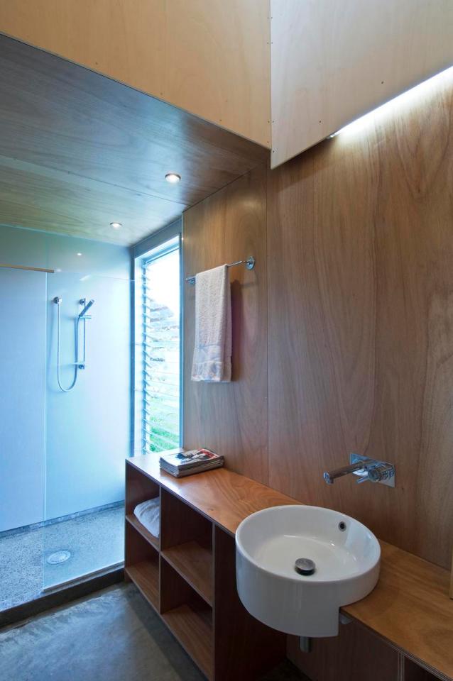 A musician's bachelor pad sits in the middle of an apple orchard. It has one bedroom and a study in 861 sq ft. | www.facebook.com/SmallHouseBliss