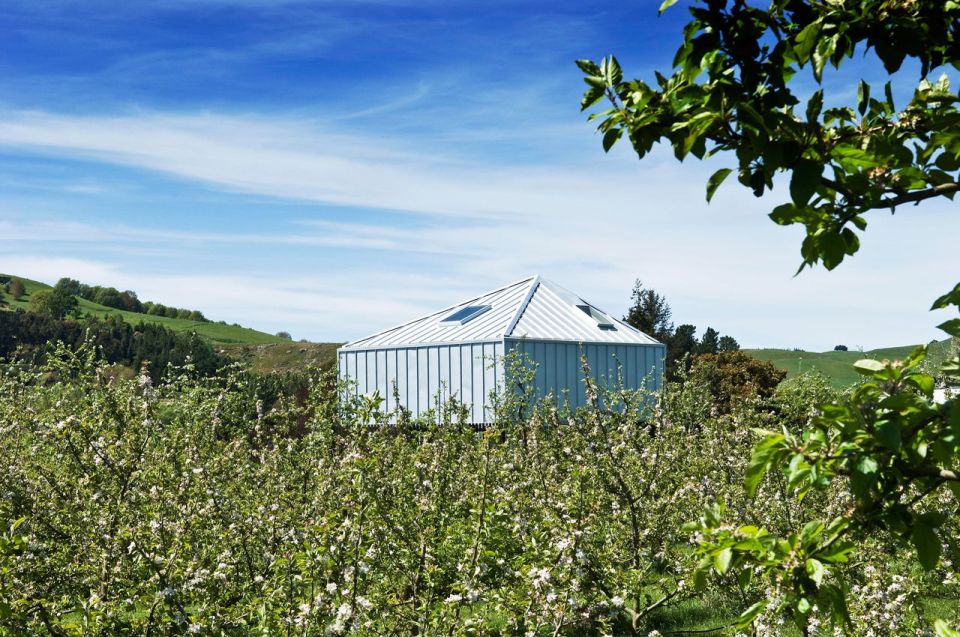 A musician's bachelor pad sits in the middle of an apple orchard. It has one bedroom and a study in 861 sq ft. | www.facebook.com/SmallHouseBliss