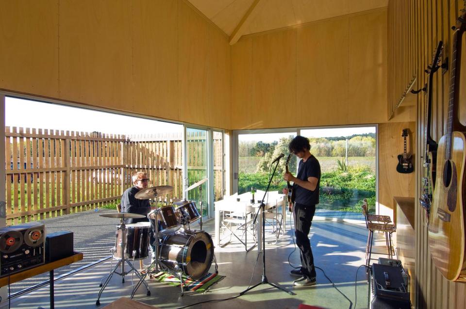 A musician's bachelor pad sits in the middle of an apple orchard. It has one bedroom and a study in 861 sq ft. | www.facebook.com/SmallHouseBliss