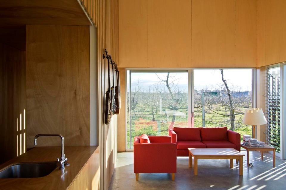 A musician's bachelor pad sits in the middle of an apple orchard. It has one bedroom and a study in 861 sq ft. | www.facebook.com/SmallHouseBliss