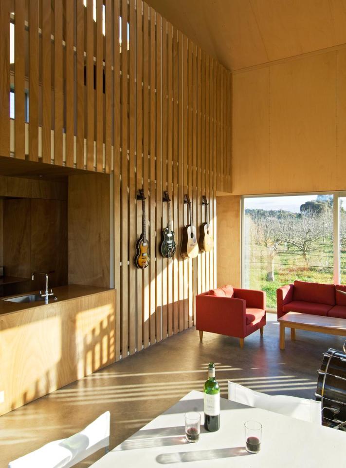 A musician's bachelor pad sits in the middle of an apple orchard. It has one bedroom and a study in 861 sq ft. | www.facebook.com/SmallHouseBliss