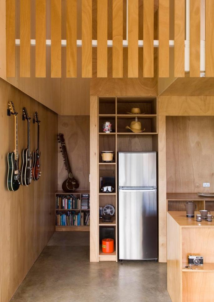 A musician's bachelor pad sits in the middle of an apple orchard. It has one bedroom and a study in 861 sq ft. | www.facebook.com/SmallHouseBliss