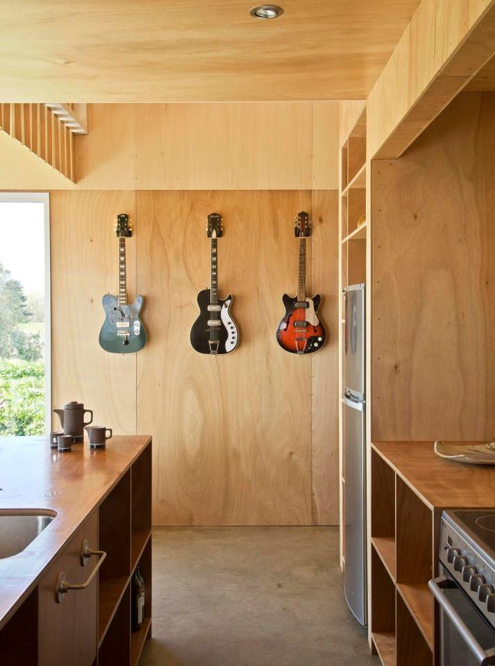 A musician's bachelor pad sits in the middle of an apple orchard. It has one bedroom and a study in 861 sq ft. | www.facebook.com/SmallHouseBliss
