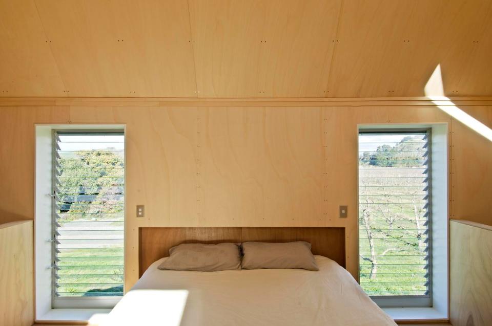 A musician's bachelor pad sits in the middle of an apple orchard. It has one bedroom and a study in 861 sq ft. | www.facebook.com/SmallHouseBliss