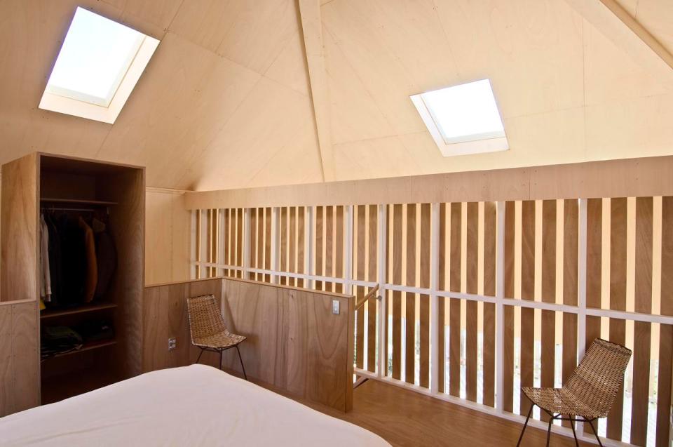 A musician's bachelor pad sits in the middle of an apple orchard. It has one bedroom and a study in 861 sq ft. | www.facebook.com/SmallHouseBliss