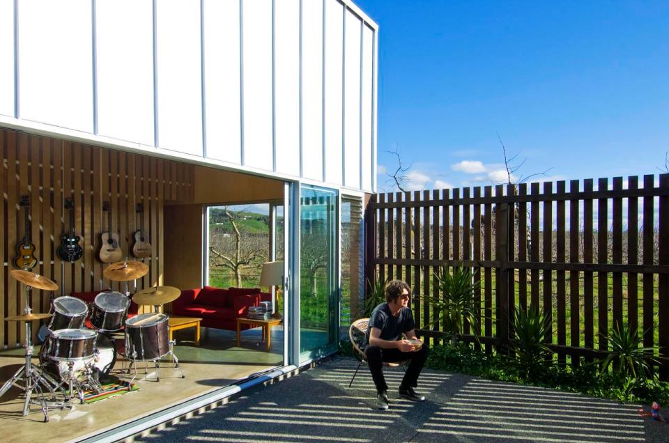 A musician's bachelor pad sits in the middle of an apple orchard. It has one bedroom and a study in 861 sq ft. | www.facebook.com/SmallHouseBliss