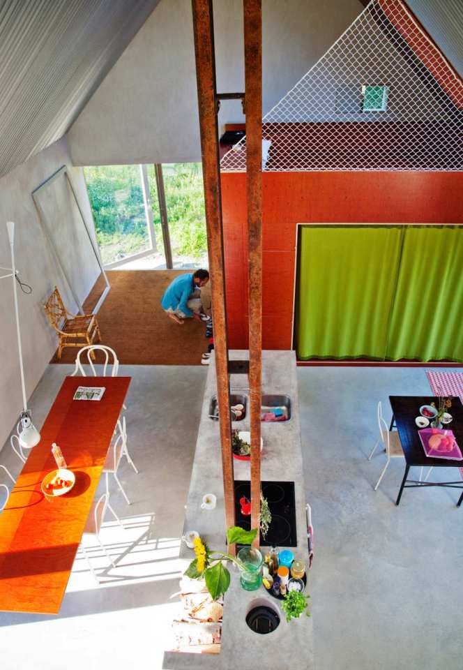 This small summer house in Sweden was inspired by local barns. It has an open interior with two sleeping spaces in 689 sq ft. Straightforward design and simple materials kept the cost down. | www.facebook.com/SmallHouseBliss