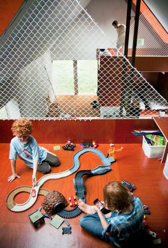 This small summer house in Sweden was inspired by local barns. It has an open interior with two sleeping spaces in 689 sq ft. Straightforward design and simple materials kept the cost down. | www.facebook.com/SmallHouseBliss