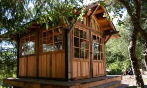 Tea house cabin in the woods by Molecule Tiny Homes